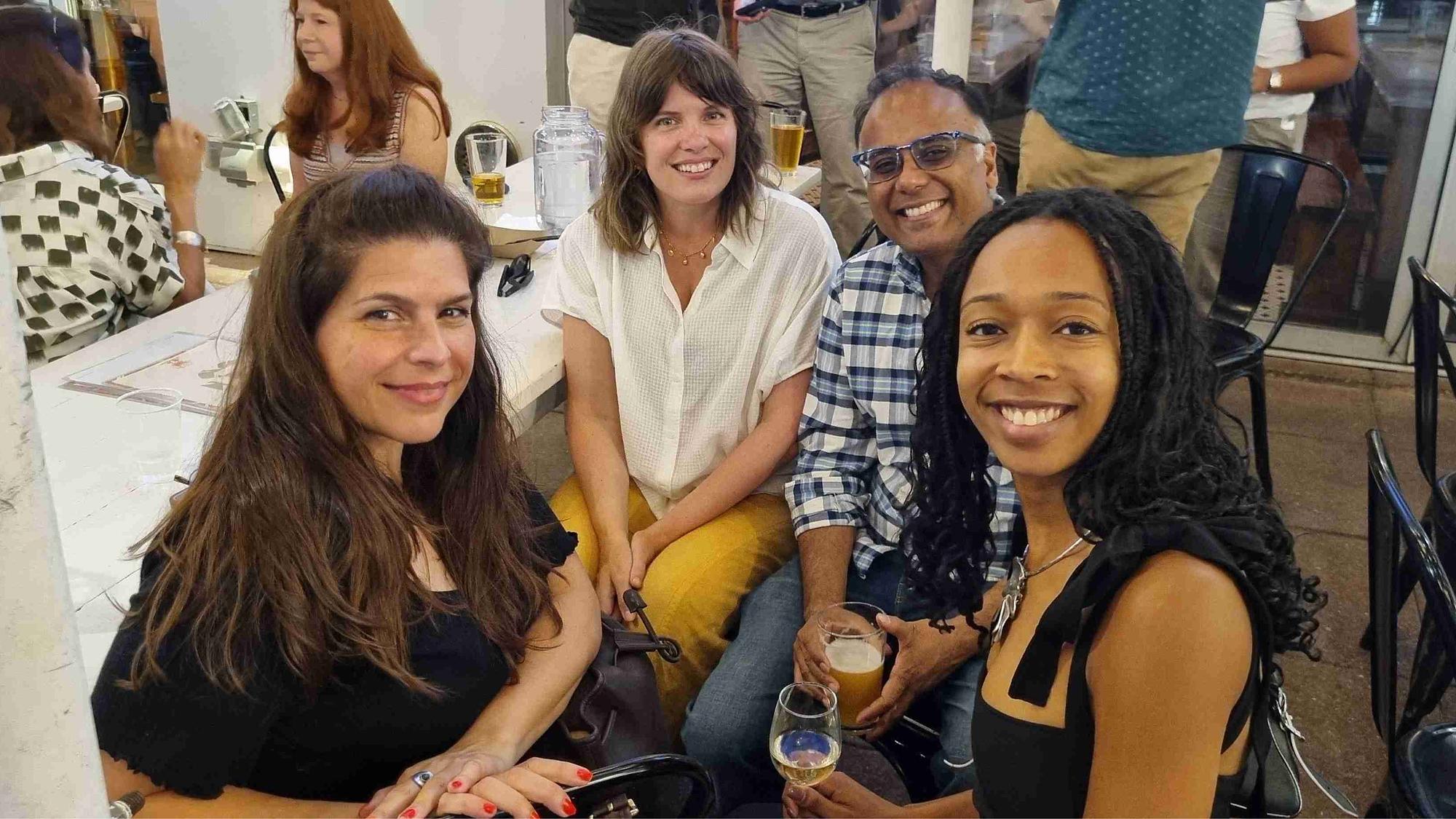 Fellows gathered at a cafe